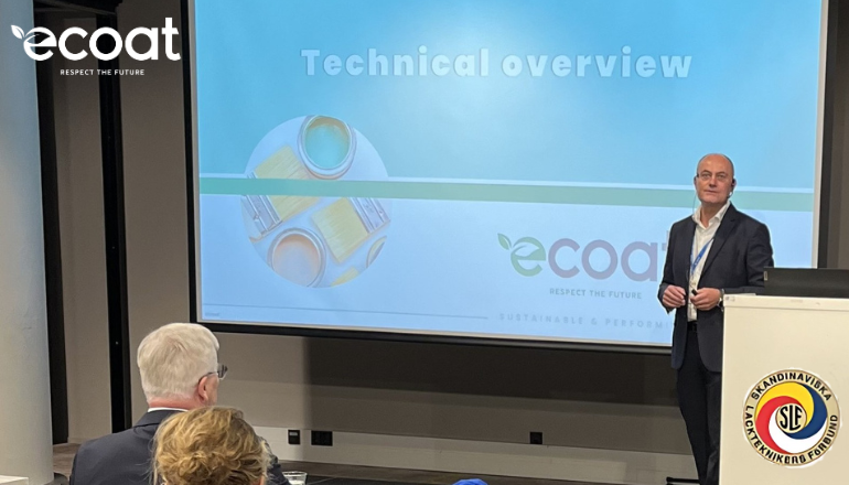 Ecoat giving a conference at SLF congress in Helsinki, 2025